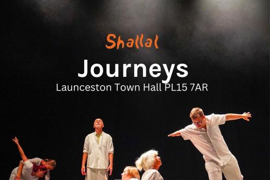 people in white on a stage,black background lights shining down and painting of a road above